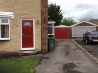 Standard Apex garage supplied with coloured door