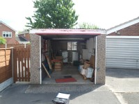Standard Apex garage supplied with coloured door