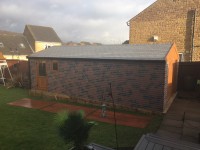 White Rose Buildings | Brick & Slate Effect Apex Garage Brick Effect Concrete Garage