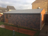 White Rose Buildings | Brick & Slate Effect Apex Garage Brick Effect Concrete Garage