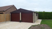 White Rose Buildings | Garden transformation with Brick Effect Double Garage Brick Effect Garage