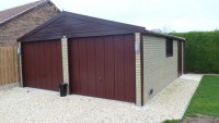 White Rose Buildings | Garden transformation with Brick Effect Double Garage Brick Effect Garage