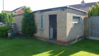 White Rose Buildings | Garden transformation with Brick Effect Double Garage Brick Effect Garage