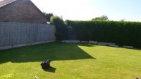 White Rose Buildings | Garden transformation with Brick Effect Double Garage Brick Effect Garage