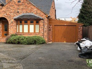 White Rose Buildings | Golden Oak Woodgrain Lean to Sectional Garage Lean to Garage