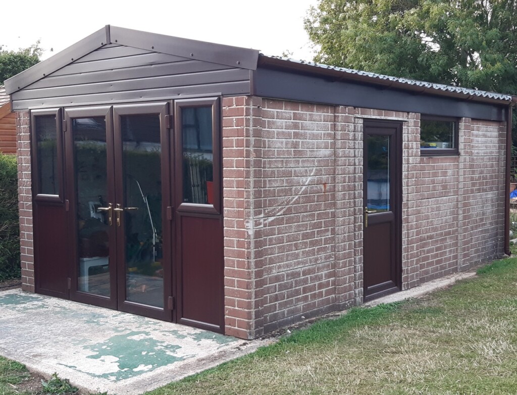 White Rose Buildings | Refurbishment to sectional brick effect garage Concrete garage prices